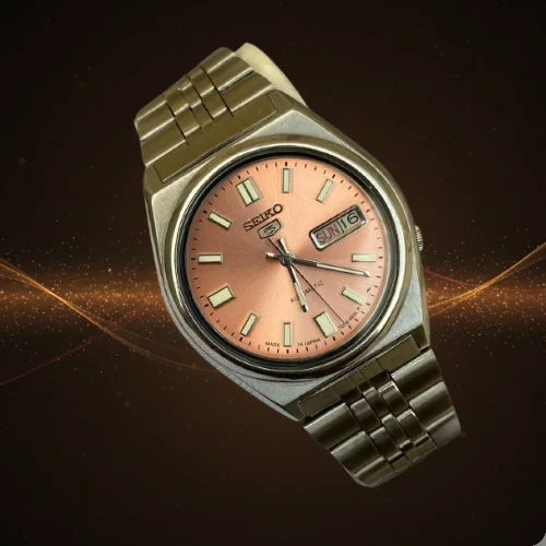 Vintage SEIKO 5 Automatic Salmon Sunburst Dial 7009-469L – Japan Made Classic Men's Watch