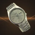 Vintage Seiko DX Automatic Sleek Silver Sunburst Dial 7009 Movement